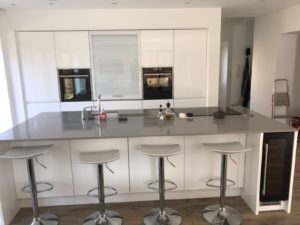White Gloss Handleless fitted kitchen, Fairfield Park Stotfold