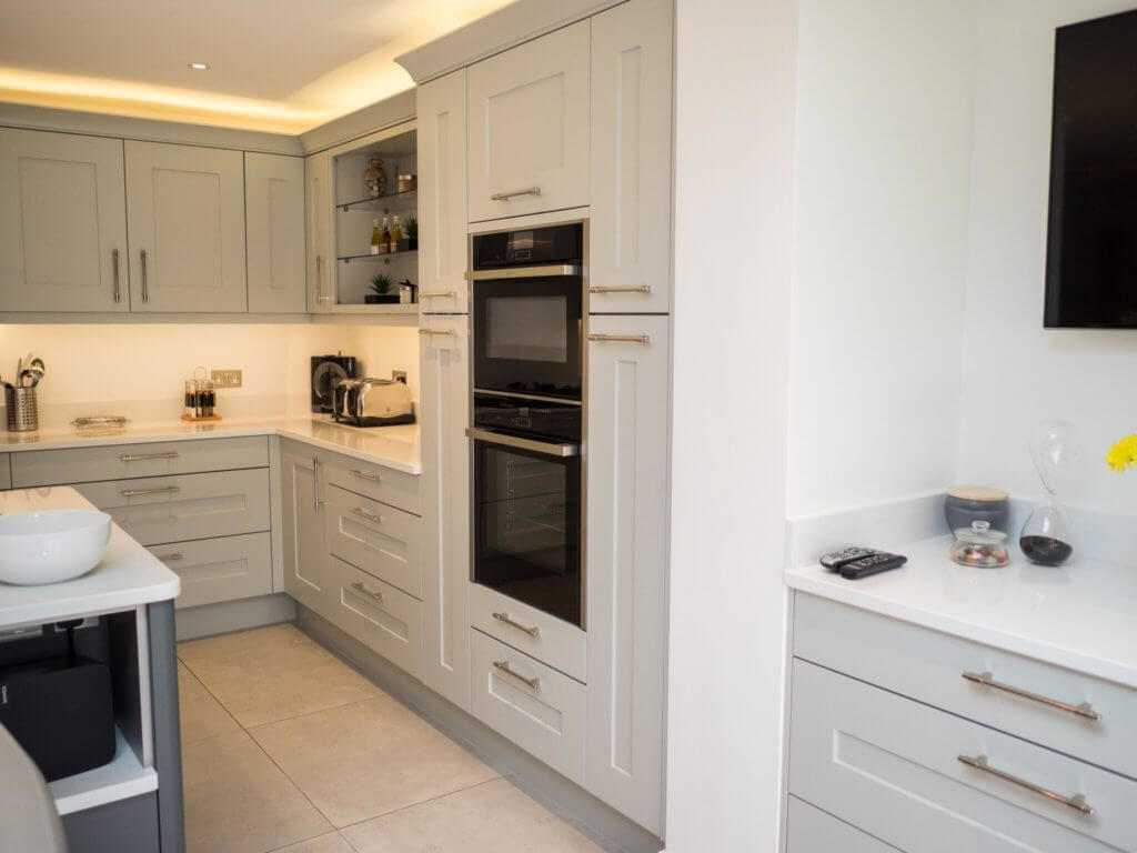 Painted grey oven housing unit featuring the Neff Slide and Hide Oven Kitchen Ergonomics Painted grey oven housing unit featuring the Neff Slide and Hide Oven Kitchen Ergonomics