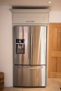 Bespoke cabinetry to house the american fridge freezer