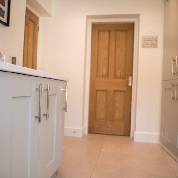 Painted grey utility Room with quartz worktop