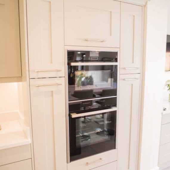 Painted grey oven housing unit featuring the Neff Slide and Hide Oven