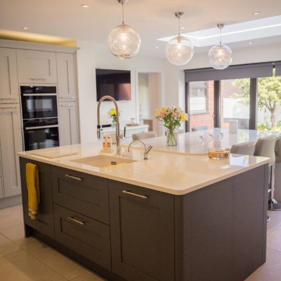 Painted Grey and Slate kitchen with white quartz worktop