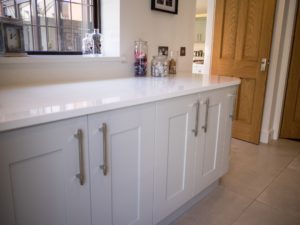 Painted grey utility Room with quartz worktop