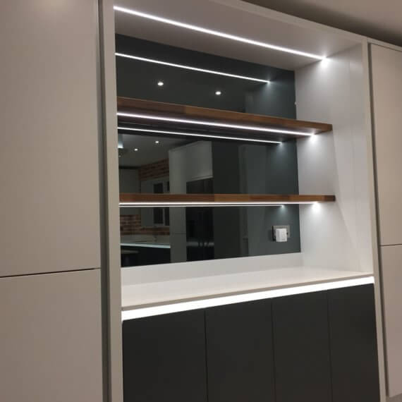 Grey mirrored glass splash back with shelving