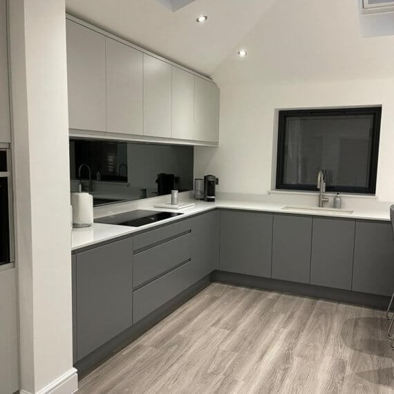 Light Grey and Dust Grey kitchen with mirrored splashbacks