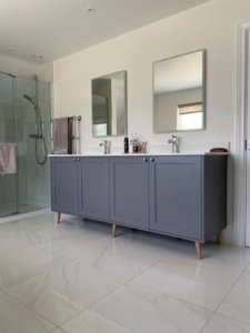 Bespoke bathroom furniture with raised legs
