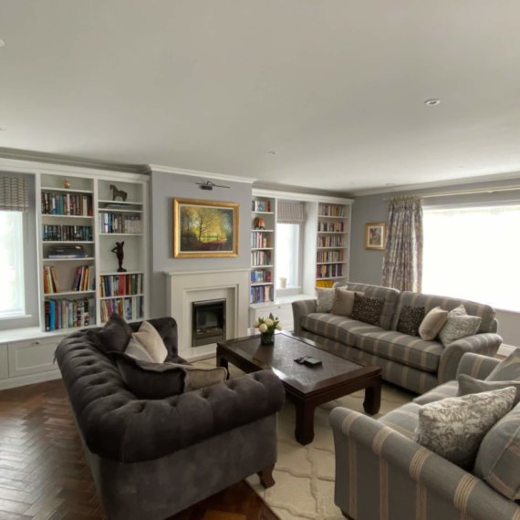 Living area with bespoke book shelves