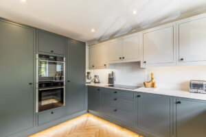 Heritage Green and Light Grey In-Frame Slab Kitchen