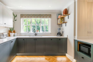 Heritage Green and Light Grey In-Frame Slab Kitchen