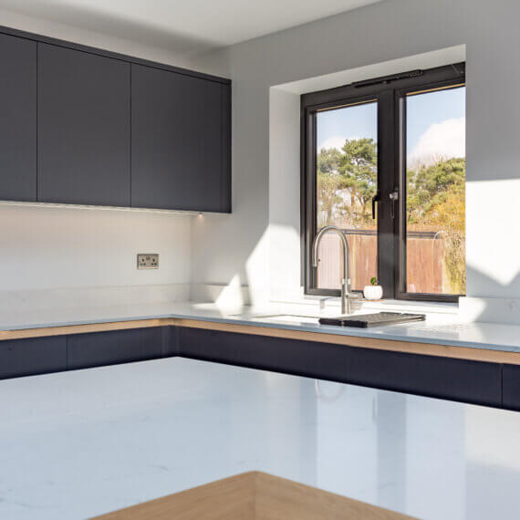 Indigo Kitchen with Quartz and Oak Worktops